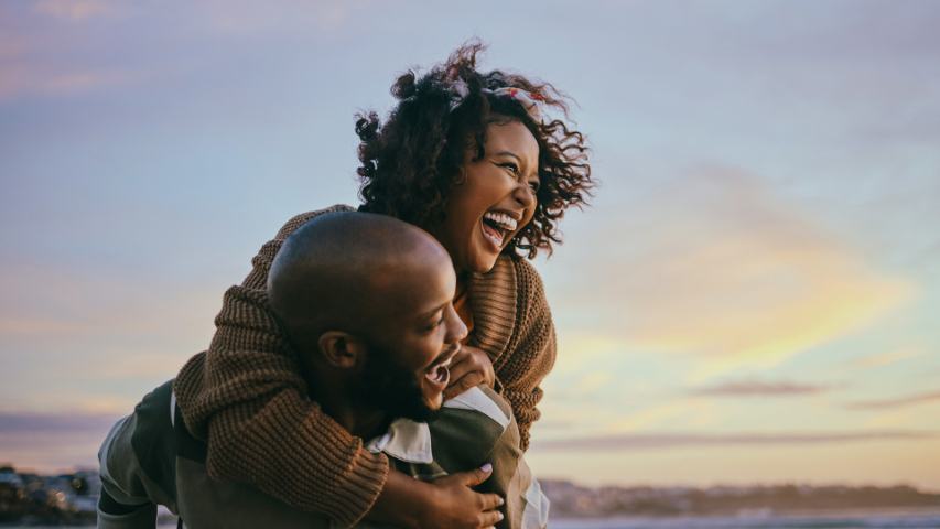 couple enjoying the sunset at the beach