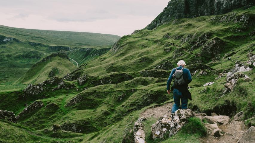 white haired hill walker