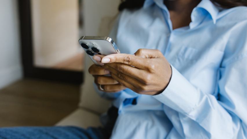 woman checking her messages on the phone